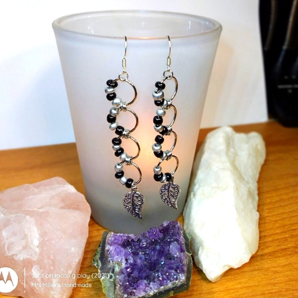 Handmade Black and silver bead earrings with leaves.